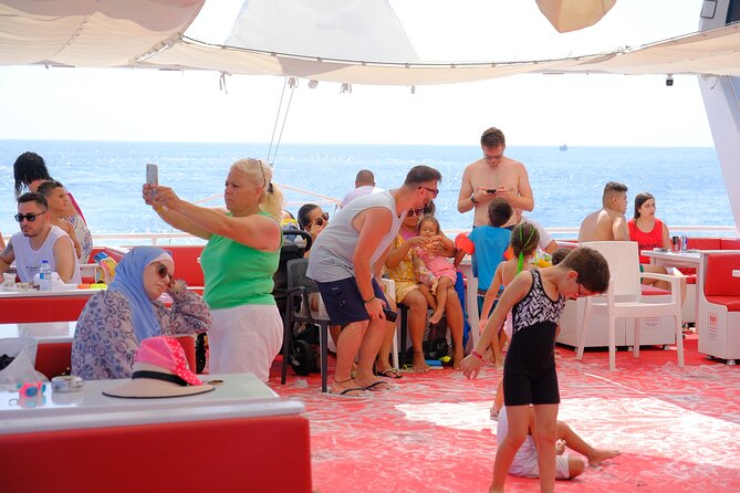 Alanya Boat Trip w/Unlimited Drinks & Lunch (Free Hotel Transfer) - What the included insurance and A/C change for you