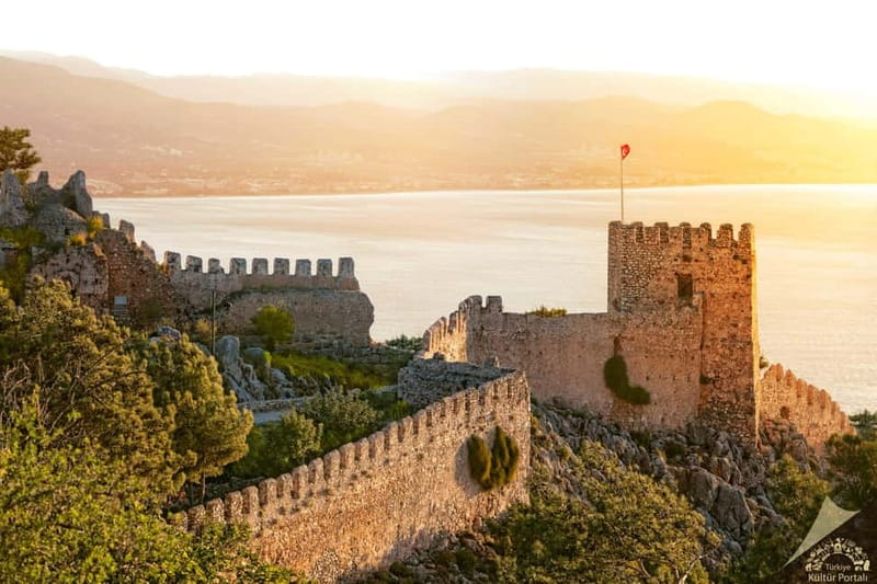 Alanya: Full-Day City Tour with Sunset Views, Beach, & Caves - Boat along the coast and outside views of Kızılkule (Red Tower)