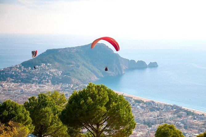 Alanya Paragliding Experience By Local Expert Pilots W/ Transfer - The tandem flight over Cleopatra’s Bay, timed to weather