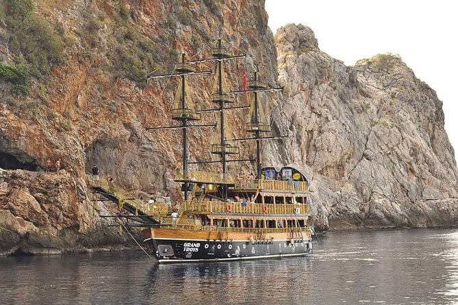 Alanya Pirate Boat Trip With Unlimited Drinks & Lunch - Sailing the Alanya coast: swim stops and dolphin hopes