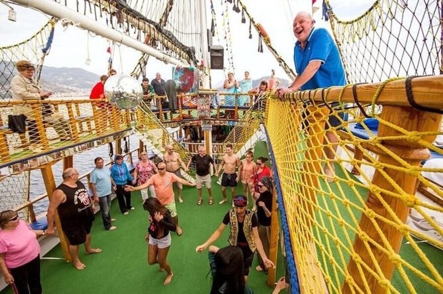 Alanya: Pirates Boat Trip with Lunch and Hotel Pickup - Boarding the pirate boat: crew energy, music, and the foam party
