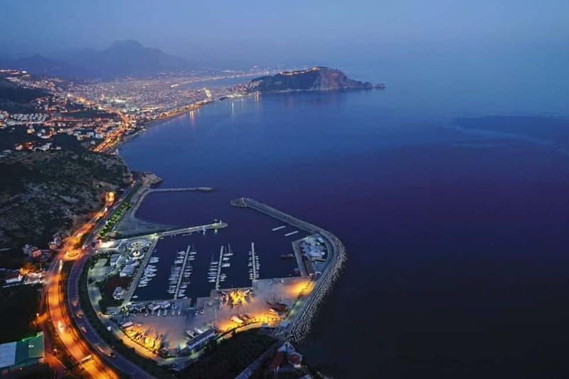 Alanya Sunset Pirate Boat: Music & Foam Party - Coastline cruising past castle walls, sea caves, and toward Cleopatra Beach