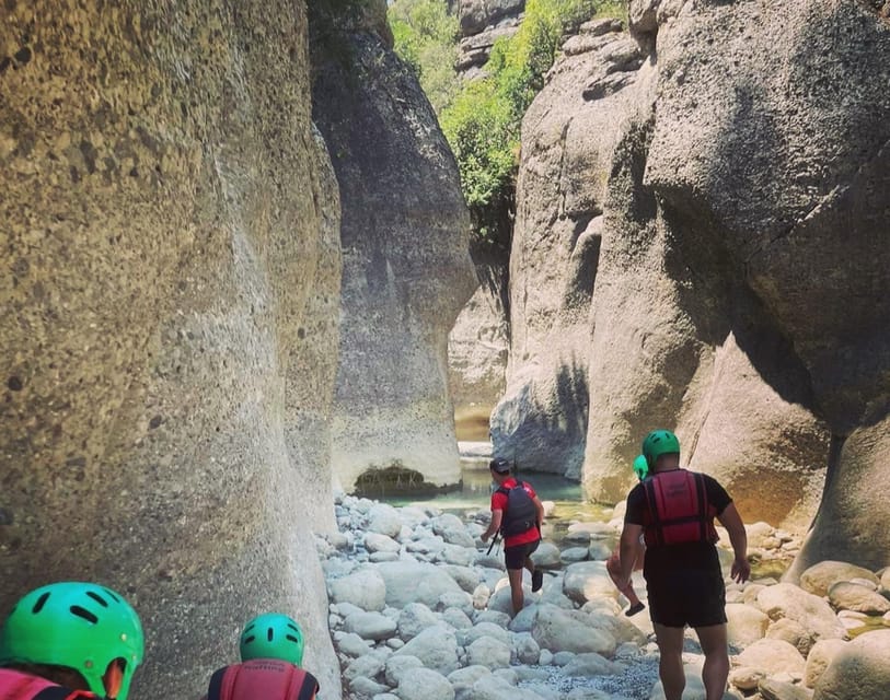 Antalya: Canyoning, Rafting, Quad, Jeep & Zipline with Lunch - Canyoning at Koprulu: sliding into cold water and the bridge moment