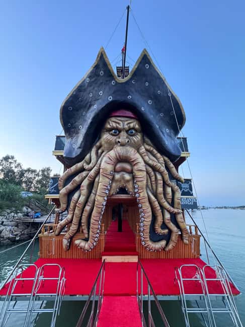 Antalya: Lara Pirate Boat Day Trip w/ Lunch & Soft Drink - Pirate-Ship Energy and Views Leaving Lara Beach Behind