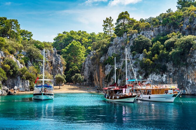 Blue Lagoon, Butterfly Valley and Oludeniz Islands Boat Trip - Mavi Magara Blue Cave: the first real blue-water payoff