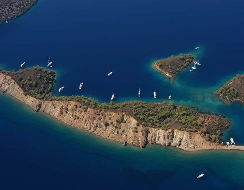 Bodrum: Karaada Boat Cruise with Lunch - Black Island hot springs, a mineral-rich stop with an optional fee