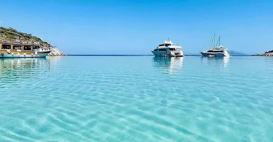 Bodrum: Orak Island Boat Trip with Lunch & Optional Transfer - Swim stops and snorkeling in German Bay and beyond
