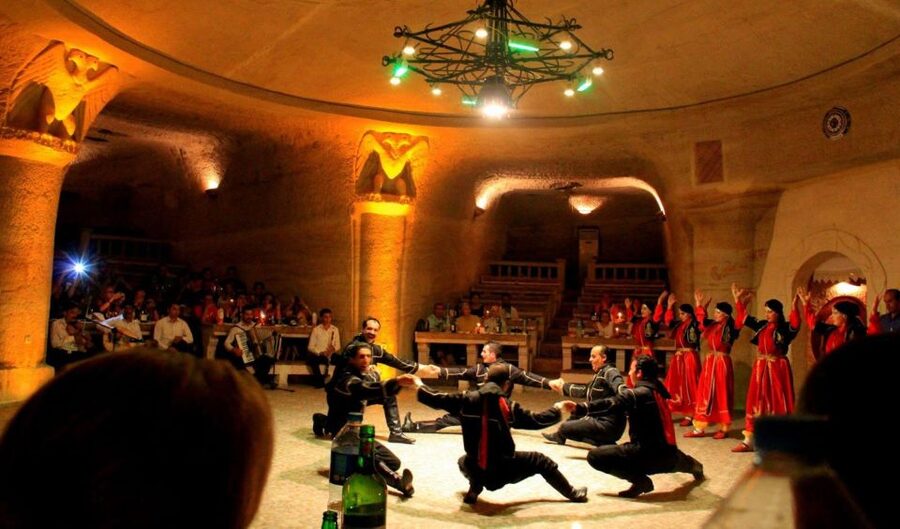 Cappadocia: Traditional Turkish Performance Night with Drink - Yaşar Baba Restaurant, Uçhisar’s cave setting before the dancing starts