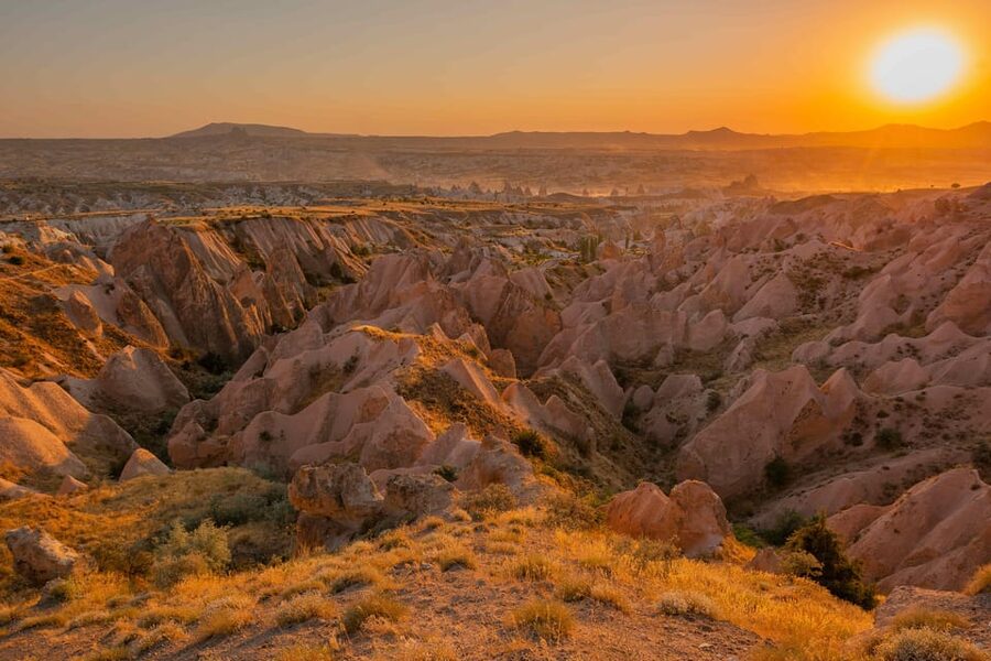 Cappadocia Watching the Sunset With Wine in Red Valley - Red Valley at sunset, and why the timing feels so special