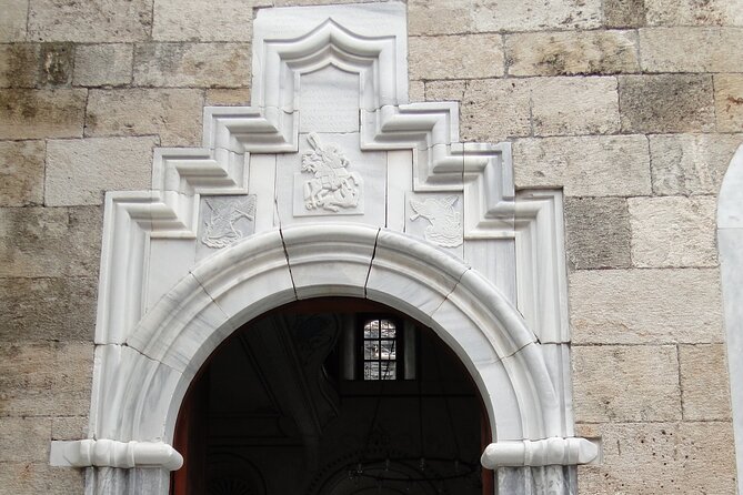 Explore The Old Town With Local Taste - Kaleiçi Marina, ancient harbor walls, and the mountain views