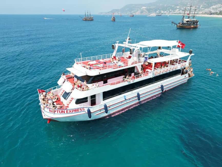 From Alanya: Boat Tour with Unlimited Soft Drinks and Lunch - Entering the Alanya Marina Scene and Choosing Your Pickup