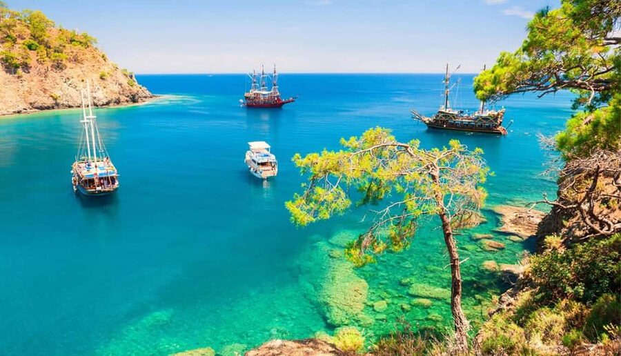 From Antalya: Kemer Pirate Boat Tour with Foam Party & Swim - Hotel pickup to Kemer marina: how the day starts