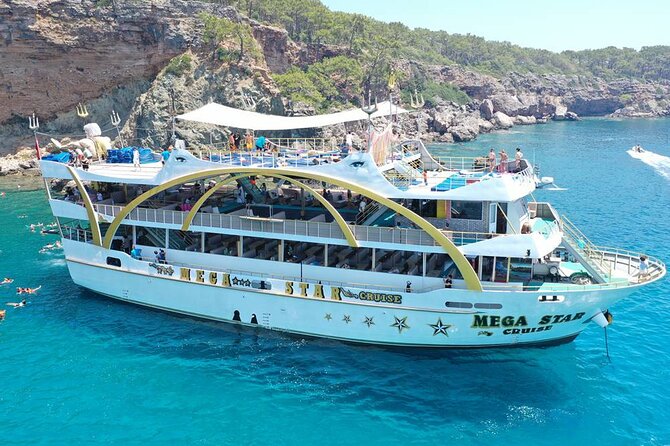 From Antalya To Kemer Mega Star Boat Trip w/Free Transfer - Boarding the Mega Star: comfort, shade, and crew energy