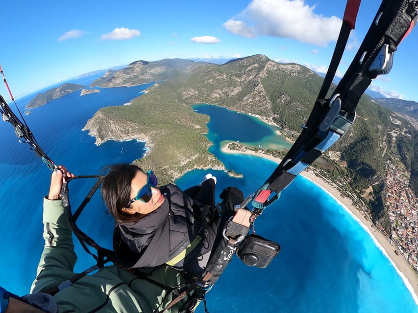 From Fethiye: Oludeniz Paragliding Trip with Transfer - What to bring: sunglasses, sports shoes, and a phone plan