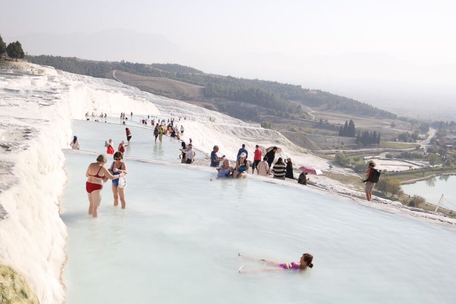 From Izmir: Pamukkale Day Trip with Lunch - Hierapolis in one guided sweep: gates, temples, baths, and the underworld