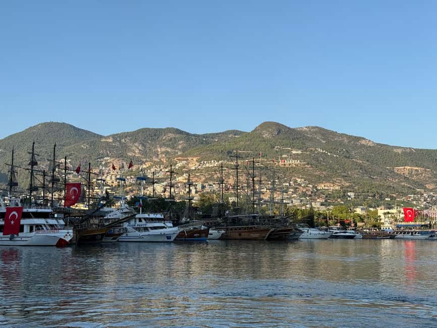 From Side: Alanya Tour with Optional Cable Car and Boat Ride - Alanya Harbor and the Red Tower from the water