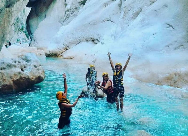 Kemer: Party Bus to Goynuk Canyon with Entrance Ticket - The Party Bus Ride: Music, Cabri Style Fun, and Pickup Reality
