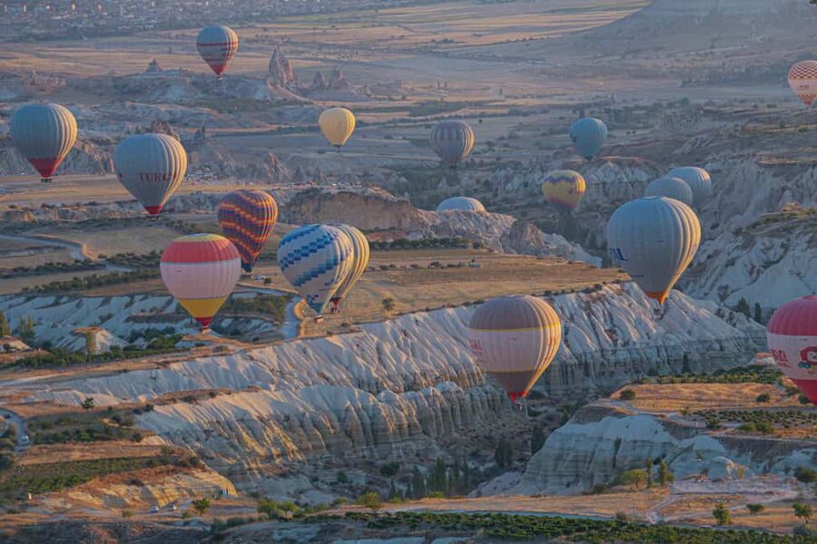 Red (North) Tour Cappadocia with Lunch and Tickets - Uchisar Castle area: big rock center stage and fast photo time